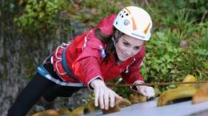 Duchess of Cambridge ascends a climbing wall surface as she visits the Towers Residential exterior Education Centre