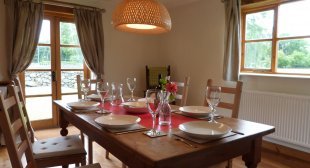 huge dining table with breathtaking views for the surrounding country side